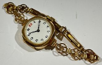 A 9ct gold ladies cocktail watch, white enamel dial, fancy link articulated bracelet