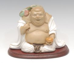 A Chinese pottery figure, of Budai, 15cm wide