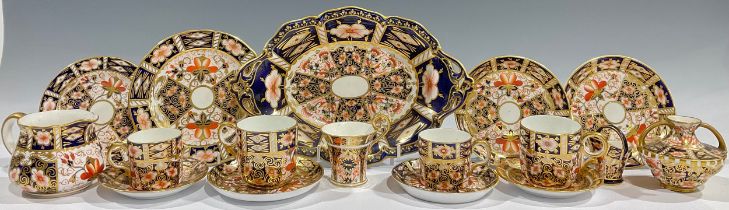 A Royal Crown Derby Imari 1128 pattern coffee cup and saucer, year cypher for 1930; other Royal