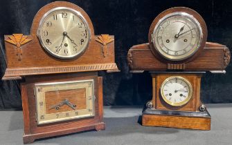 An early 20th century French mantel clock, architectural ebonised and inlaid case, white enamel