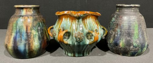 A Linthorpe pottery ovoid vase, after Christopher Dresser, applied with flowerhead bosses between
