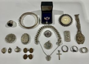 A silver curb link bracelet, padlock clasp, 61g; silver lockets and pendants; a pair of silver