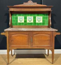 An Art Nouveau walnut tile back washstand, 122cm wide, c.1900