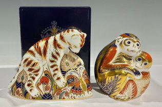 A Royal Crown Derby paperweight, Bengal Tiger Cub, gold stopper, boxed; another, Monkey and Baby, no