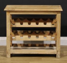 A pine oenophile’s wine rack, rectangular top above twelve bottle provisions, 60cm high, 70.5cm