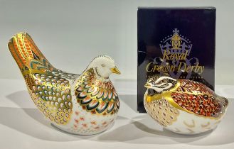 A Royal Crown Derby paperweight, Turtle Dove, gold stopper, printed mark in red; another, Dappled