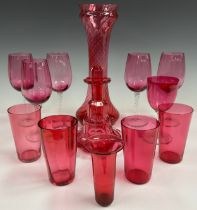 A collection of Cranberry glass, including wine glasses, tumblers, scent bottle, etc, 19th century
