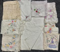 Textiles - hand embroidered linen table cloths, including English Country Garden