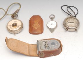 An early 20th century pocket voltmeter, 8.5cm over loop; an amp meter, etc (4)