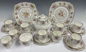 A Royal Albert Petit Point pattern tea set comprising tea pot, milk jug and sugar bowl, eight