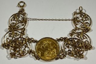 A 9ct gold fancy link bracelet, set with a single full gold sovereign, George V 1912, the bracelet