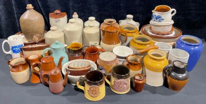 Kitchenalia - a quantity of stoneware, including footwarmers, cooking pots and bowls, preserve jars,