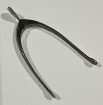 A pair of George V silver novelty sugar tongs, as a wishbone, James Dixon & Sons, Birmingham 1933