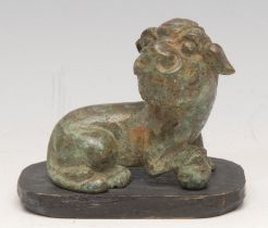 A Chinese verdigris patinated bronze, of a temple lion, in the Archaic taste, 6cm long