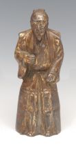 A Japanese antimony figure, of an elder, 19cm high, early 20th century