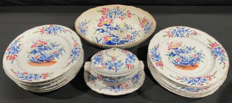 An early 19th century pearlware part dinner service, printed in blue and white with hand painted