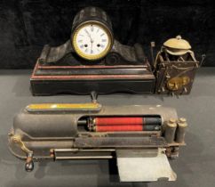 A 19th century French black marble mantel clock, c.1880; a two-train clock movement; a