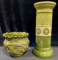 A Leeds Art Pottery majolica jardiniere pedestal, moulded in relief with stylised flower heads and