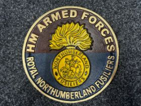A cast iron commemorative plaque "HM Armed Forces Royal Northumberland Fusiliers". 235mm in