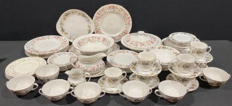 A Royal Doulton Woodland Rose pattern dinner service for six, comprising vegetable dish, serving