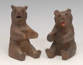 A Black Forest carving, of a bear, 9.5cm high, c.1900; another (2)