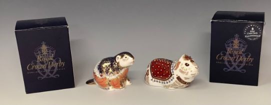 A Royal Crown Derby paperweight, Guinea Pig, gold stopper, 12.5cm, boxed; another, Riverbank Beaver,