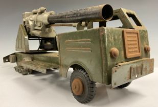 Toys & Juvenalia - a Louis Marx tinplate and battery operated mobile long range atomic cannon truck,