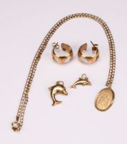 A 9ct gold St Christpher pendant and chain, marked 375; two 9ct gold dolphin pendants; a pair of 9ct