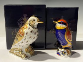 A Royal Crown Derby paperweight, Song Thrush, gold stopper, boxed; another, Bee-eater, gold stopper,