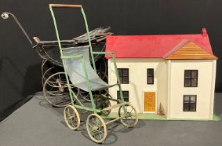 Toys and Juvenalia - an Edwardian doll's pram; a mid 20th century doll's pushchair; a mid 20th