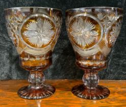 A pair of substantial Bohemian cranberry glass vases