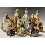 A Chinese export ware stoneware figure, Woodcutter; others similar (7)