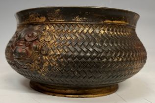 A Chinese bronze censer, lion mask handles, character marks to base, approx. 21cm wide over handles,