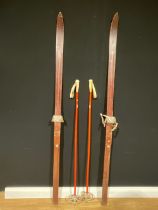 A pair of wooden Akadia skis, 205cm long; a pair of Kranz ski poles (4)