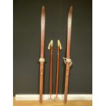 A pair of wooden Akadia skis, 205cm long; a pair of Kranz ski poles (4)