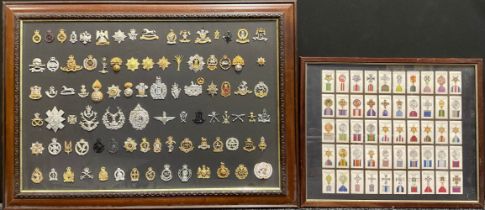 A Military badge collection; a cigarete card medal set