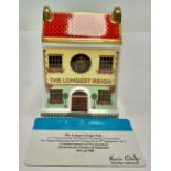 A Royal Crown Derby miniature model of a house, The Longest Reign Pub, 10cm high, commemorates HRH