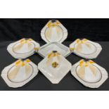 A Shelley Vogue Sunray pattern part dinner service, comprising tureen, dinner plates and dessert