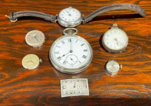 An early 20th century trench wristwatch; a gun metal fob watch; a silver plated pocket watch; Art