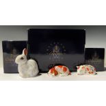 A Royal Crown Derby paperweight, Snowy Rabbit, gold stopper, boxed; others, Sleeping Piglet, gold