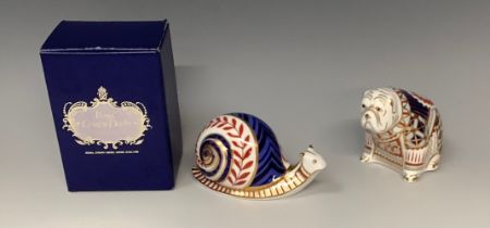 A Royal Crown Derby paperweight, Snail, gold stopper, 12.5cm wide, boxed; another, Bulldog, gold