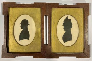 English School (early 20th century), a pair of silhouettes, oak frames