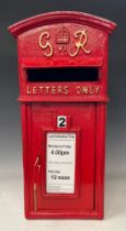 A George VI style cast iron Post Office letter box, painted red with gold painted lettering, 58.