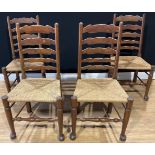 A set of four oak and elm Lancashire ladderback dining chairs, 99cm high, 51cm wide, the seat 39cm