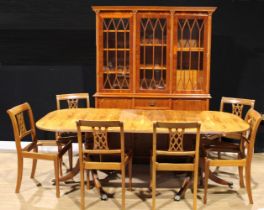 A contemporary 19th century style yew veneer library bookcase or display cabinet, 196.5cm high,