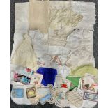 Textiles - a box of miscellaneous linen and lace, including early lace shawl, embroidered dragon