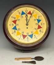 A reproduction RAF fusee wall clock, 32cm diameter dial, 38cm diameter overall, with key and