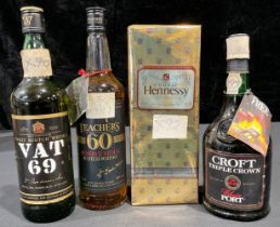 A bottle of Hennessey Cognac, boxed; others, Teacher's 60 Reserve Stock Scotch whisky; VAT 69