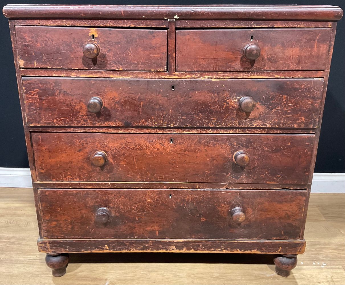 A Victorian pine chest, of two short and three long drawers, 104cm high, 105cm wide, 46cm deep