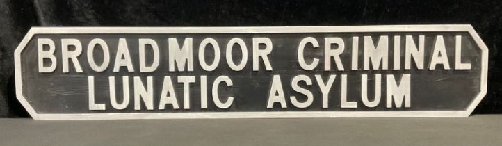 A wooden replica sign of 'Broadmoor criminal Lunatic Asylum', 121.5cm long